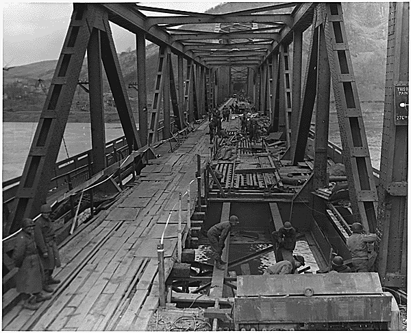soldiers repairing floor of a bridge soldiers repairing floor of a bridge